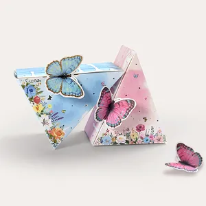 Pink and blue watercolor triangle favor boxes with 3D butterfly toppers for parties