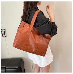 Brown bark texture tote bag with large capacity showing quality stitching on model