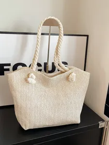 Minimalist beige woven tote bag with cotton rope handles for summer beach casual use