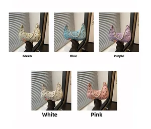 Collage of five pastel bow handbags with pearl handles in green, blue, purple, white, and pink