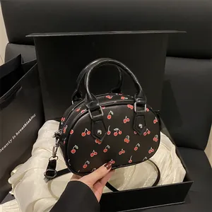 Chic black cherry print crossbody handbag in a premium gift box with satin lining