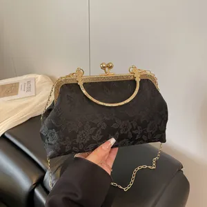 Sac à main vintage chinois noir avec broderie florale et bandoulière en chaîne dorée