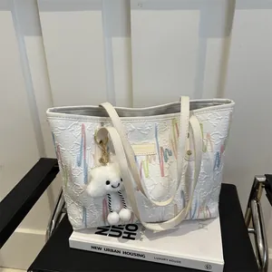 White large capacity tote bag with colorful wave patterns and a cloud pendant