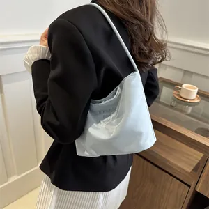 Light blue minimalist tote bag with onwards and upwards embroidery on premium fabric