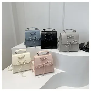 Kompakte Damen-Rucksäcke mit Schleife in Blau, Schwarz, Grau, Weiß und Rosa