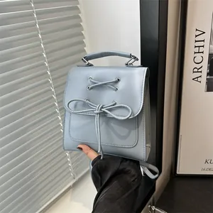 Damen Mode PU Leder Kleiner Rucksack Schleife Überkreuzte Riemen Handtasche Koreanischer Stil Casual Schultertasche Mini Büchertasche