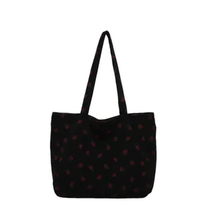 Grand sac cabas en velours côtelé noir avec imprimé fraises et doubles poignées