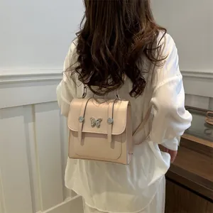 Cream butterfly mini backpack for women, multi-functional shoulder bag in chic design