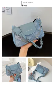 Blue denim texture underarm bag with silver flower chain and leather braided strap