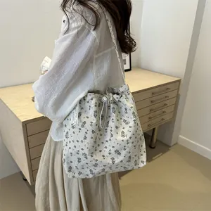 Borsa a secchiello floreale da donna stile pigro con coulisse e tracolla regolabile chic