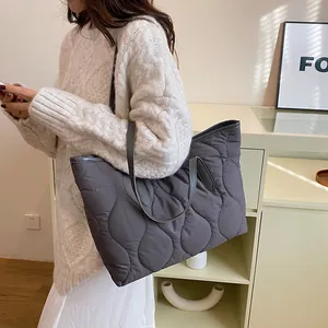 Quilted down fabric tote bag with long leather handles in dark coffee for daily commute