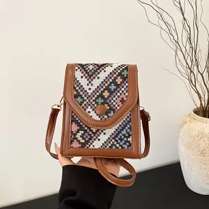 Vintage crossbody phone bag with brown PU leather and ethnic geometric weave pattern