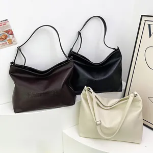 Minimalist soft leather tote bags for women in black, brown and off-white colors