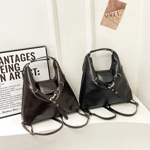 Retro large-capacity tote bag in black and brown glossy leather with adjustable straps