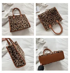 Detail shots of leopard print plush tote bag with brown leather handles and base