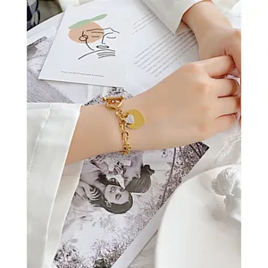 Bracciale a catena dorata in acciaio inossidabile con chiusura OT e ciondolo a cuore