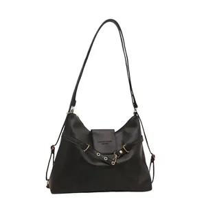 Large black PU leather tote bag with gold hardware for commuting and stylish autumn outfits