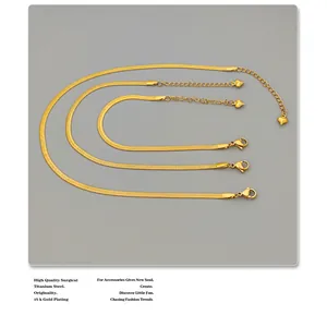Detailed macro view of 18k gold plated titanium steel snake chain set with lobster clasp