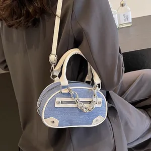 Blue denim mini handbag with white leather trim and silver chain for women