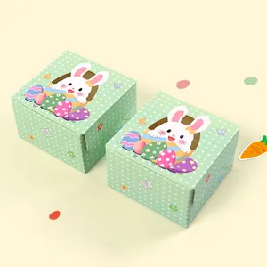 Green polka dot Easter gift boxes featuring cute white bunny and colorful eggs
