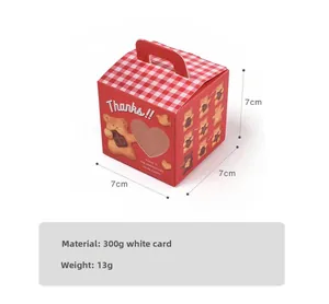 Detail of square gift box with clear heart window and cute bear pattern 7x7x7cm