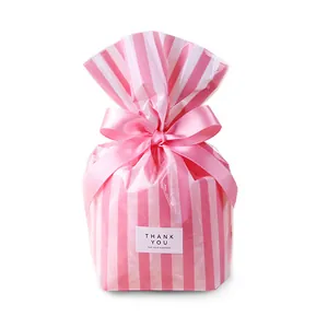 Pink striped PP food packaging bags with satin ribbons and Thank You labels
