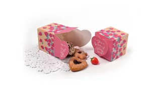 Detailed strawberry gift boxes with heart-shaped closure and decorative text design