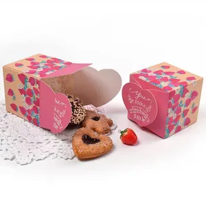 Pink heart-shaped gift box with strawberry patterns and striped design for cute packaging