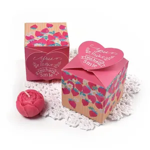 Pink strawberry gift box set with heart cutout and flower scented candle