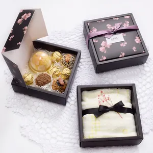 Premium black floral gift box set with elegant silk ribbons for wedding favors