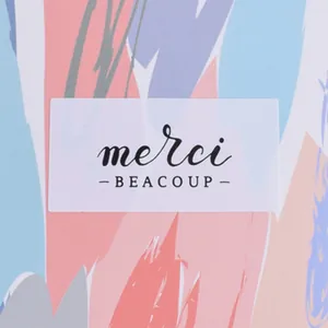 Detail of rectangular sticker with artistic pastel strokes and merci beaucoup text