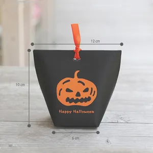 Halloween trapezoid gift box with pumpkin print and ribbon, size 12x10x6 cm details