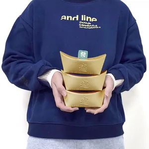 Three-piece set of golden ingot-shaped candy gift boxes for Lunar New Year decor
