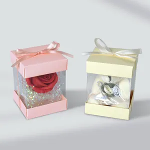Scatole regalo quadrate rosa e gialle con finestra in PVC e fiocco in seta decorativo