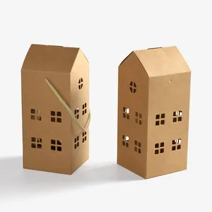 Brown house-shaped kraft paper gift boxes with rope handles and window cutouts