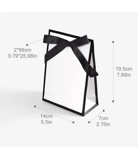 White minimalist gift bag with black ribbon and detailed size dimensions in cm and inches