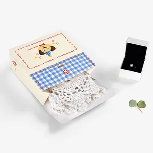 Checkered gift box with cartoon dog and congratulations text for cookies or accessories
