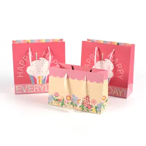 Floral gift bag set with cupcake prints and silk handles for Mother's Day presents