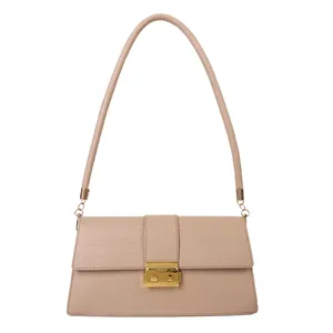 Elegant beige crocodile pattern shoulder bag with golden metal lock and long strap