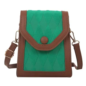 Mini sac à bandoulière bicolore vert et marron avec texture en maille losange chic