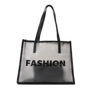 Minimalist transparent white tote bag with black trim and FASHION lettering