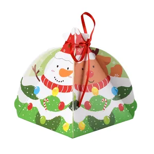 Cajas de caramelos navideñas triangulares con motivos festivos de árboles y muñecos