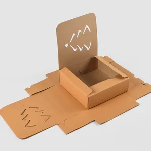 Caja de regalo de papel kraft marrón con diseño de estrella en estructura plegada