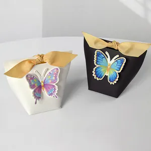 3D butterfly DIY gift boxes in black and cream white with gold ribbons for events