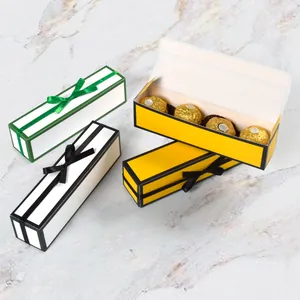 Scatola regalo rettangolare con fiocco per cioccolato nei colori bianco e giallo