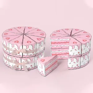 Pink strawberry cake shaped paper gift boxes with silk ribbons for birthday party favors