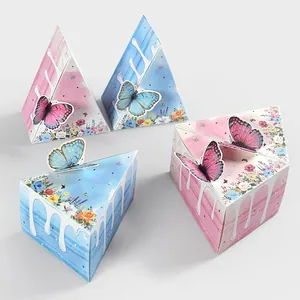 Triangle cake slice gift boxes in pink and blue with 3D butterfly toppers