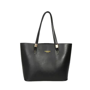 Klassische schwarze große Leder-Einkaufstasche mit eleganten goldenen Metallbeschlägen