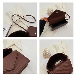 Detail view of coffee quilted bag with faux fur handle and magnetic snap closure