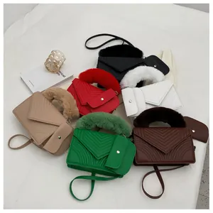 Flat lay of quilted crossbody bags with faux fur handles and matching mini pouches